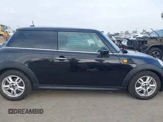 2011 MINI Hardtop with VIN WMWSU3C50BT098905, listed as a IAAI auction lot 42637688 with 118,389 mi miles and . Bid and sale history available at DreamBid. Image 13.