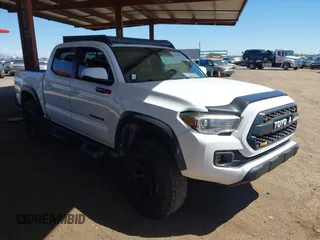 2016 Toyota Tacoma SR with VIN 5TFCZ5ANXGX028464, listed as a IAAI auction lot 41834385 with 124,407 mi miles and . Bid and sale history available at DreamBid. Image 1.