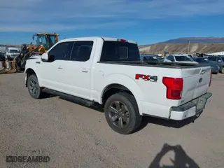 2019 Ford F-150 XL with VIN 1FTEW1E44KFA16434, listed as a IAAI auction lot 40818478 with 131,763 mi miles. Bid and sale history available at carsss.com. Image 3.