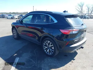 2020 Ford Escape Titanium z VIN 1FMCU9J98LUA44923, wystawiony jako IAAI lot #41779691 z przebiegiem 73 259 mil mil oraz . Historia ofert i sprzedaży dostępna na DreamBid. Obrazek 3.