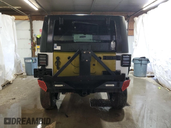 2007 Jeep Wrangler Unlimited X with VIN 1J4GA39187L190061, listed as a Copart auction lot 52420685 with 217,346 mi miles and Salvage Title. Bid and sale history available at DreamBid. Image 6.