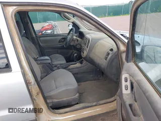 2006 Ford Escape XLT with VIN 1FMYU93186KC23802, listed as a IAAI auction lot 42611582 with 166,871 mi miles and . Bid and sale history available at DreamBid. Image 5.