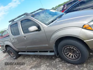 2005 Nissan Frontier LE with VIN 1N6AD07UX5C447844, listed as a IAAI auction lot 42184393 with 202,226 mi miles and . Bid and sale history available at DreamBid. Image 13.