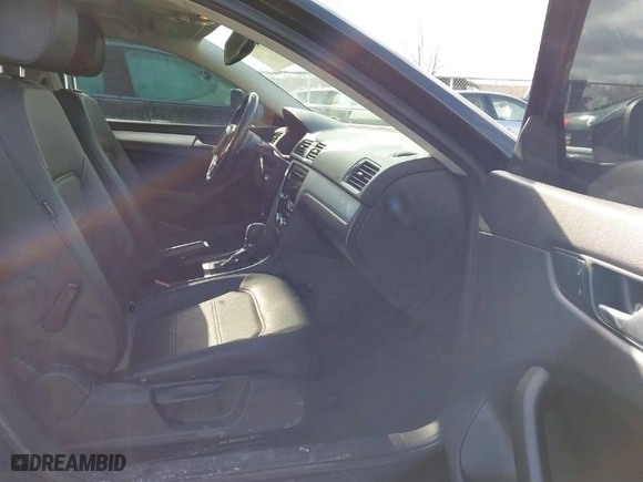 2012 Volkswagen Passat SE w/Sunroof with VIN 1VWBP7A31CC077742, listed as a IAAI auction lot 41489979 with 152,508 mi miles. Bid and sale history available at carsss.com. Image 5.