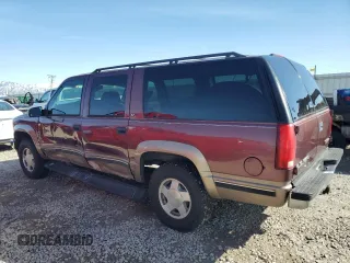 1997 GMC Suburban with VIN 1GKFK16R0VJ739603, listed as a Copart auction lot 48430045 with 195,017 mi miles and Salvage Title. Bid and sale history available at carsss.com. Image 2.