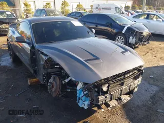 2021 Ford Mustang GT z VIN 1FA6P8CF9M5117126, wystawiony jako IAAI lot #41647619 z przebiegiem 31 076 mil mil oraz . Historia ofert i sprzedaży dostępna na DreamBid. Obrazek 6.