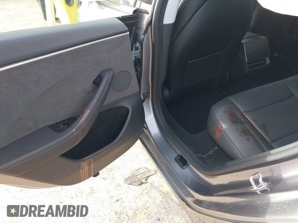 2025 Tesla Model 3 Long Range with VIN 5YJ3E1EB4SF873799, listed as a IAAI auction lot 41548818 with 2,129 mi miles and . Bid and sale history available at DreamBid. Image 19.