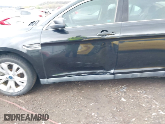 2011 Ford Taurus SEL with VIN 1FAHP2EW7BG153319, listed as a IAAI auction lot 41864229 with 190,512 mi miles. Bid and sale history available at carsss.com. Image 6.
