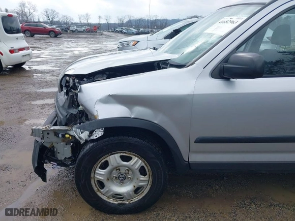 2005 Honda CR-V LX with VIN JHLRD78535C042479, listed as a IAAI auction lot 41682963 with 216,777 mi miles. Bid and sale history available at carsss.com. Image 18.