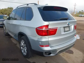 2011 BMW X5 35i with VIN 5UXZV4C5XBL407637, listed as a IAAI auction lot 41454552 with 204,510 mi miles. Bid and sale history available at carsss.com. Image 3.