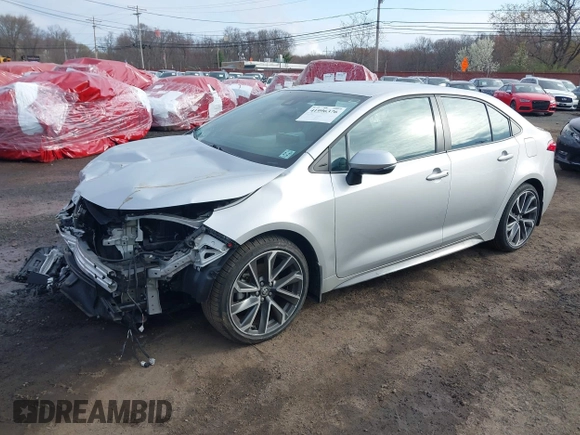 2022 Toyota Corolla SE with VIN 5YFS4MCE2NP108810, listed as a IAAI auction lot 41996376 with 45,701 mi miles and . Bid and sale history available at DreamBid. Image 2.