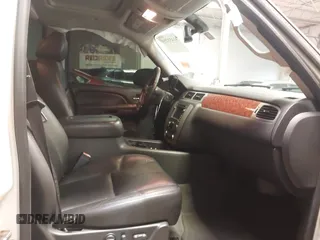 2009 GMC Yukon SLT w/4SB with VIN 1GKFC33069R299683, listed as a IAAI auction lot 41453259 with 182,415 mi miles. Bid and sale history available at carsss.com. Image 5.