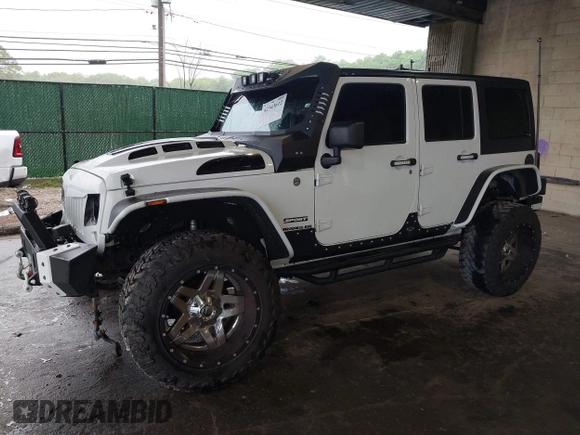 2012 Jeep Wrangler Unlimited Sport с VIN 1C4BJWDG8CL183831, выставлен на аукционе IAAI как лот 42343612 с пробегом 166 847 миль миль и . История ставок и продаж доступна на DreamBid. Изображение 18.