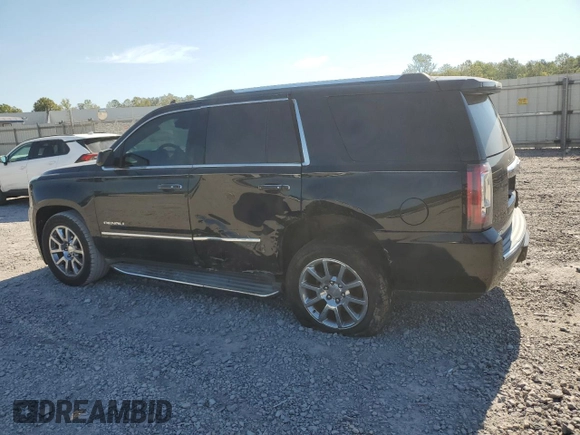 2015 GMC Yukon Denali with VIN 1GKS2CKJ9FR173812, listed as a Copart auction lot 72577144 with 207,940 mi miles and Salvage Title. Bid and sale history available at carsss.com. Image 2.