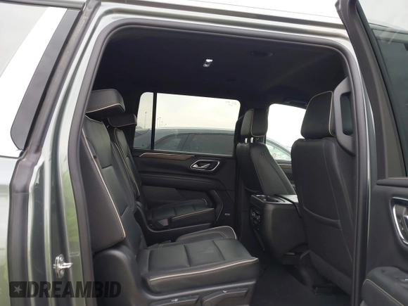 2023 Chevrolet Suburban Premier z VIN 1GNSCFKD8PR362870, wystawiony jako IAAI lot #42148476 z przebiegiem 54 983 mil mil oraz . Historia ofert i sprzedaży dostępna na DreamBid. Obrazek 8.