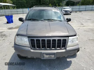 1999 Jeep Grand Cherokee Limited with VIN 1J4GW68S6XC713297, listed as a Copart auction lot 55264384 with 98,912 mi miles and Salvage Title. Bid and sale history available at carsss.com. Image 5.