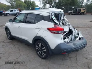 2019 Nissan Kicks S with VIN 3N1CP5CU2KL559112, listed as a IAAI auction lot 41528293 with 97,255 mi miles. Bid and sale history available at carsss.com. Image 3.