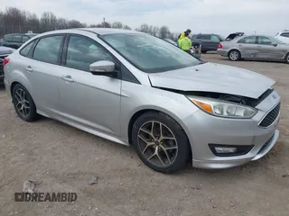 2016 Ford Focus SE with VIN 1FADP3F20GL228831, listed as a IAAI auction lot 42115033 with 106,975 mi miles. Bid and sale history available at carsss.com. Image 1.