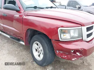 2006 Dodge Dakota SLT with VIN 1D7HE48KX6S598831, listed as a IAAI auction lot 41292884 with 173,181 mi miles and . Bid and sale history available at carsss.com. Image 6.