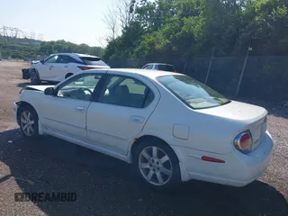 2003 Nissan Maxima GLE with VIN JN1DA31A03T421052, listed as a IAAI auction lot 42556685 with 240,183 mi miles and . Bid and sale history available at DreamBid. Image 3.