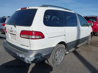 2001 Toyota Sienna LE with VIN 4T3ZF13CX1U327083, listed as a IAAI auction lot 41588036 with 220,064 mi miles. Bid and sale history available at carsss.com. Image 4.