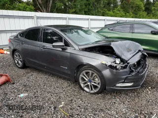 2017 Ford Fusion Hybrid SE with VIN 3FA6P0LU1HR216557, listed as a Copart auction lot 61540425 with 172,438 mi miles and Clean title. Bid and sale history available at DreamBid. Image 4.
