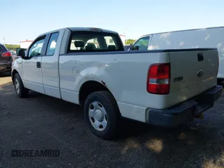 2007 Ford F-150 STX with VIN 1FTRX12W07FA84452, listed as a IAAI auction lot 42560437 with 314,539 mi miles and . Bid and sale history available at DreamBid. Image 3.