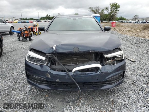 2017 BMW 5 Series 530i xDrive with VIN WBAJA7C3XHWA70310, listed as a Copart auction lot 52139025 with 56,498 mi miles and Clean Title. Bid and sale history available at carsss.com. Image 5.