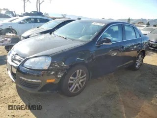 2007 Volkswagen Jetta z VIN 3VWJF71K97M034874, wystawiony jako Copart lot #42377765 z przebiegiem 200 816 mil mil oraz Szkoda całkowita • Salvage title. Historia ofert i sprzedaży dostępna na DreamBid. Obrazek 1.