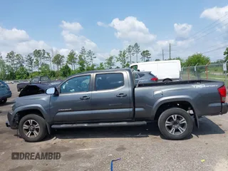 2017 Toyota Tacoma SR5 z VIN 3TMBZ5DN6HM010168, wystawiony jako IAAI lot #42315125 z przebiegiem 133 934 mil mil oraz . Historia ofert i sprzedaży dostępna na DreamBid. Obrazek 15.