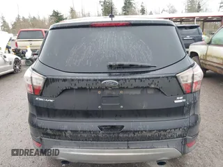 2017 Ford Escape SE with VIN 1FMCU9GD9HUB45195, listed as a IAAI auction lot 41916930 with 126,084 mi miles. Bid and sale history available at carsss.com. Image 16.