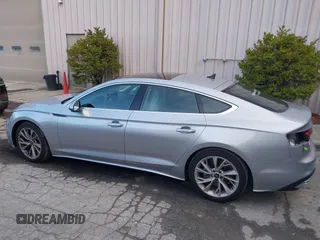2024 Audi A5 Sportback Premium z VIN WAUABCF57RA023069, wystawiony jako IAAI lot #39079825 z przebiegiem 2 810 mil mil oraz . Historia ofert i sprzedaży dostępna na DreamBid. Obrazek 14.