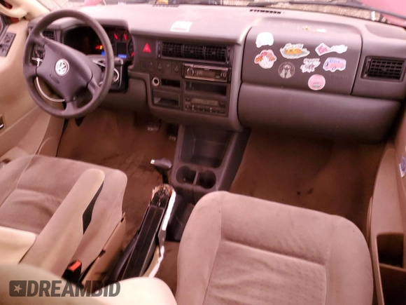 2003 Volkswagen EuroVan с VIN WV2KB47093H015569, выставлен на аукционе Copart как лот 81954144 с пробегом 166 304 миль миль и Чистый • Clean title. История ставок и продаж доступна на DreamBid. Изображение 8.