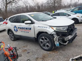 2017 Honda CR-V EX with VIN 2HKRW2H56HH682396, listed as a IAAI auction lot 41569854 with 74,392 mi miles. Bid and sale history available at carsss.com. Image 14.