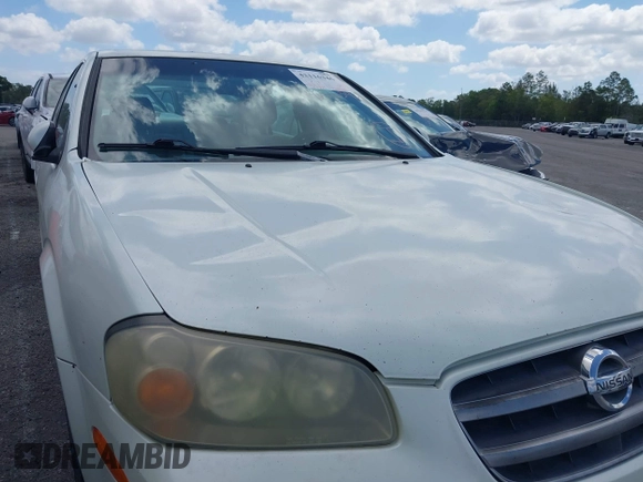 2003 Nissan Maxima SE z VIN JN1DA31DX3T501453, wystawiony jako IAAI lot #42116346 z przebiegiem 127 364 mil mil oraz . Historia ofert i sprzedaży dostępna na DreamBid. Obrazek 12.