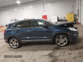 2015 Lincoln MKC with VIN 5LMTJ2AH0FUJ28744, listed as a IAAI auction lot 41888775 with 145,872 mi miles. Bid and sale history available at carsss.com. Image 13.