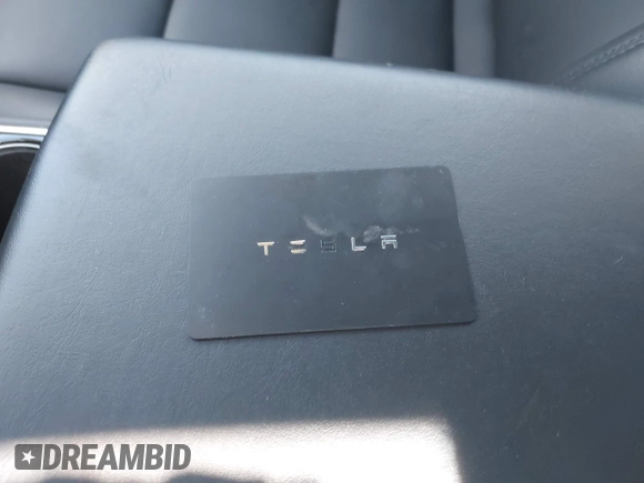 2018 Tesla Model 3 Long Range Battery z VIN 5YJ3E1EBXJF088444, wystawiony jako IAAI lot #42072860 z przebiegiem 46 063 mil mil oraz . Historia ofert i sprzedaży dostępna na DreamBid. Obrazek 11.