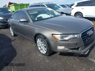 2013 Audi A6 Premium Plus z VIN WAUGGAFC6DN137550, wystawiony jako IAAI lot #41611190 z przebiegiem 117 701 mil mil oraz . Historia ofert i sprzedaży dostępna na DreamBid. Obrazek 1.