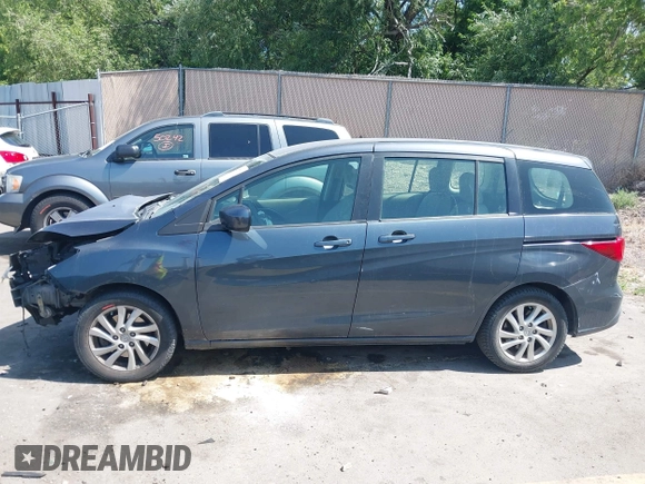 2012 Mazda 5 Sport with VIN JM1CW2BL1C0116150, listed as a IAAI auction lot 42571812 with 124,236 mi miles and . Bid and sale history available at DreamBid. Image 15.
