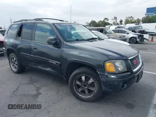 2004 GMC Envoy SLE z VIN 1GKDS13S642117336, wystawiony jako IAAI lot #42346921 z przebiegiem 120 801 mil mil oraz . Historia ofert i sprzedaży dostępna na DreamBid. Obrazek 1.