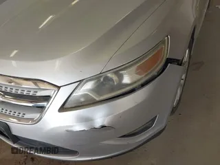 2011 Ford Taurus SEL with VIN 1FAHP2EW6BG170287, listed as a IAAI auction lot 42191702 with 199,477 mi miles. Bid and sale history available at carsss.com. Image 6.