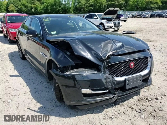 2016 Jaguar XJ R-Sport z VIN SAJWJ1CD8G8V95608, wystawiony jako Copart lot #59103615 z przebiegiem 119 066 mil mil oraz Szkoda całkowita • Salvage title. Historia ofert i sprzedaży dostępna na DreamBid. Obrazek 13.