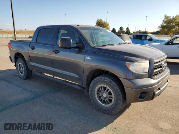 2012 Toyota Tundra 4WD Truck with VIN 5TFDW5F10CX233367, listed as a Copart auction lot 77144064 with 199,361 mi miles and Salvage Title. Bid and sale history available at carsss.com. Image 4.