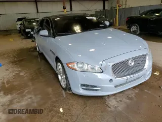 2013 Jaguar XJ with VIN SAJWJ1CD1D8V51462, listed as a Copart auction lot 50527985 with 62,995 mi miles and Salvage title. Bid and sale history available at DreamBid. Image 14.