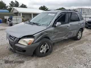 2005 Kia Sportage LX z VIN KNDJF723157134324, wystawiony jako Copart lot #59720605 z przebiegiem 223 188 mil mil oraz Czysty tytuł • Clean title. Historia ofert i sprzedaży dostępna na DreamBid. Obrazek 1.