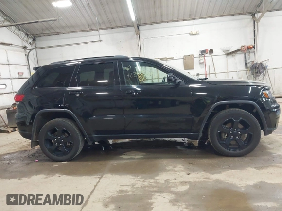 2021 Jeep Grand Cherokee Laredo X with VIN 1C4RJFAG5MC817567, listed as a IAAI auction lot 42297526 with 71,387 mi miles and . Bid and sale history available at DreamBid. Image 13.
