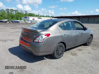 2016 Nissan Versa S Plus with VIN 3N1CN7AP1GL823488, listed as a IAAI auction lot 42060937 with 125,077 mi miles. Bid and sale history available at carsss.com. Image 4.