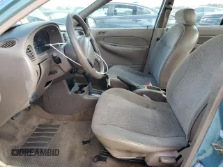 1998 Ford Escort SE with VIN 1FAFP13P6WW172730, listed as a Copart auction lot 79341124 with 128,826 mi miles and Salvage Title. Bid and sale history available at carsss.com. Image 7.