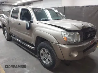 2005 Toyota Tacoma PreRunner z VIN 5TEJU62N65Z094557, wystawiony jako IAAI lot #41990607 z przebiegiem 109 219 mil mil oraz . Historia ofert i sprzedaży dostępna na DreamBid. Obrazek 1.