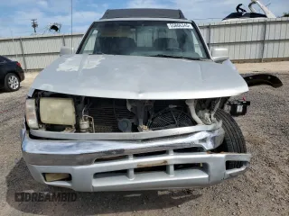 2000 Nissan Frontier XE with VIN 1N6ED27T8YC367452, listed as a Copart auction lot 55866345 with 242,945 mi miles and Salvage title. Bid and sale history available at DreamBid. Image 5.